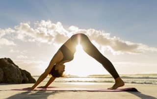 Work smarter yoga on beach